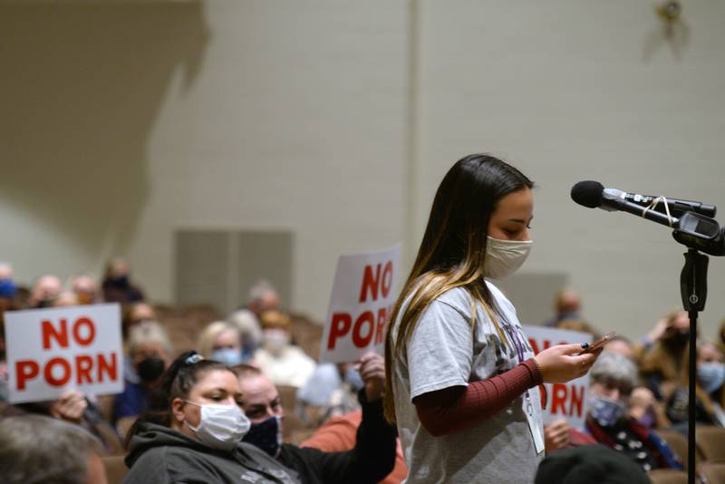 District 99 junior, Julia Hanson expresses her thoughts to board members during the public comment portion regarding the access to the book, 'Gender Queer'  in the Library of the schools Monday Nov. 15, 2021.