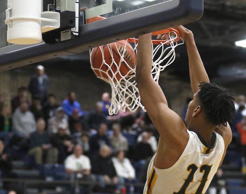 Crystal Lake South's Christian Rohde dunks the ball during the IHSA Class 3A Cary-Grove Boys Basketball Regional Championship game against Wheaton Academy on Friday, Feb. 23, 2024 at Cary-Grove High School.