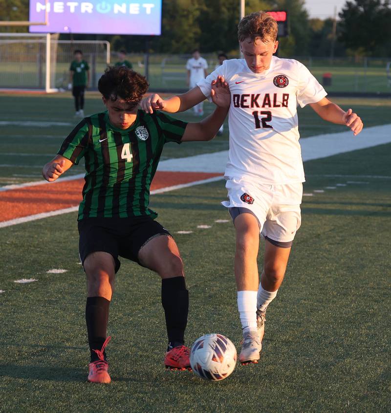 DeKalb's Nolan Tobin and St. Edward's PJ Tinajero battle for possession Thursday, Aug. 28, 2025, during their game in the Barb Cup tournament at DeKalb High School.
