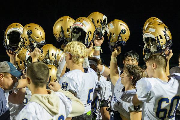 Photos: Marquette rolls over Dwight 50-19 in Week 4 football