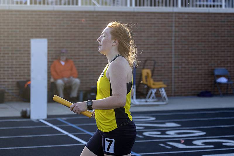 Sterling’s Kylie Nicklaus comes in the finish the 4x800 Thursday, April 27, 2023 at the Sterling Night Relays.