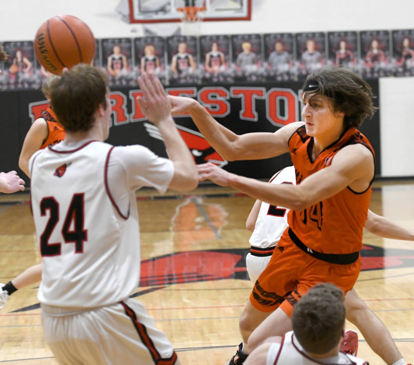 Milledgeville's Kacen Johnson (14) passes the ball during a Friday, Jan. 27 NUIC game against Forreston.