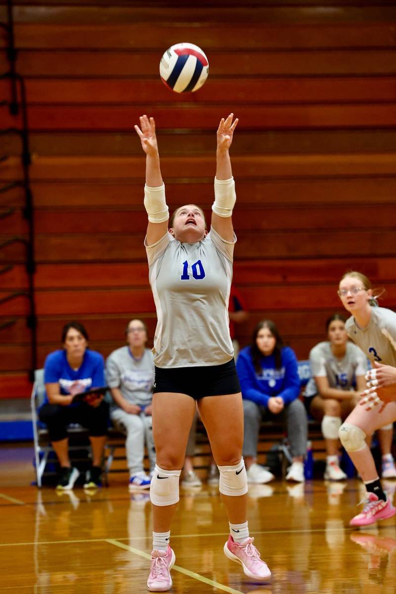 Senior setter Makayla Hecht sets for Princeton in Tuesday's Three Rivers match at Prouty Gym. The Tigresses won 2-0.