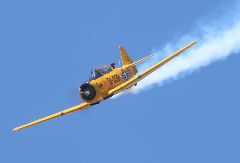 A North American T-6 Texan flies during the 11th annual TBM Reunion and Air Show on Friday, May 15, 2026 at the Illinois Valley Regional Airport in Peru.