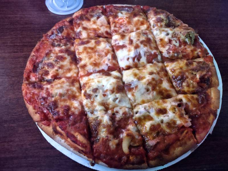 It's an Italian beef, but in a pizza! This is the 12-inch version at the Dead End Tavern Bar and Grill.
