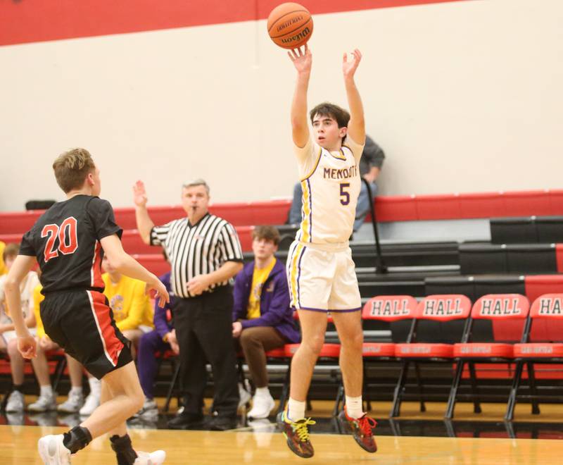 Mendota's Cameron Kelly shoots a jump shot over Stillman Valley's Ian Seper during the 49th annual Colmone Classic Tournament on Wednesday, Dec. 6, 2023 at Hall High School.