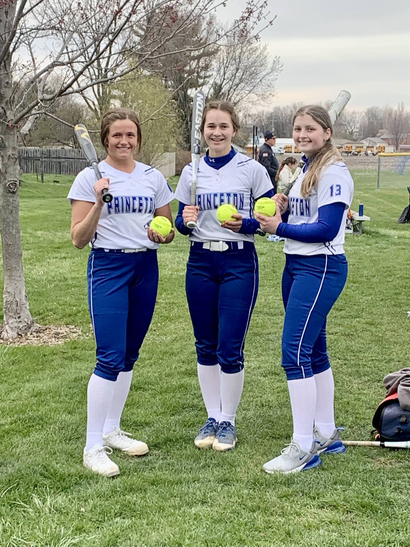 Princeton's Mckenzie Hecht (left), Hannah Muehlschlegel and Libby Boyles homered i consecutive innings to power the Tigresses to a 9-2 win over Kewanee in TRAC East softball play Tuesday at Little Siberia.