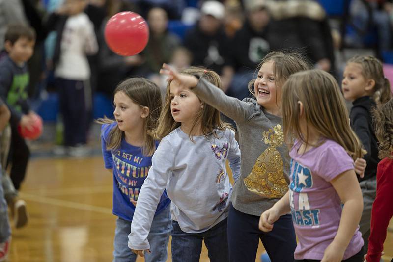 Competitors fire balls at the Grinch and his team Saturday, Nov. 19, 2022 during Rock Falls Chamber’s Grinch dodgeball. The event was part of the chamber’s Hometown Holidays.
