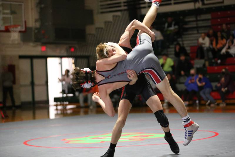 L-P's Reegan Kellett wrestles Ottawa's Nico Stanfill in the 132 weight match during a wrestling meet in Sellett Gymnasium on Wednesday Dec. 7, 2022 at L-P High School.