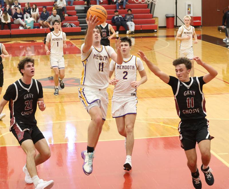 Mendota's Aden Tillman scores on a layup against Illinois Valley Central during the Colmone Classic on Friday, Dec. 12, 2025 at Hall High School.
