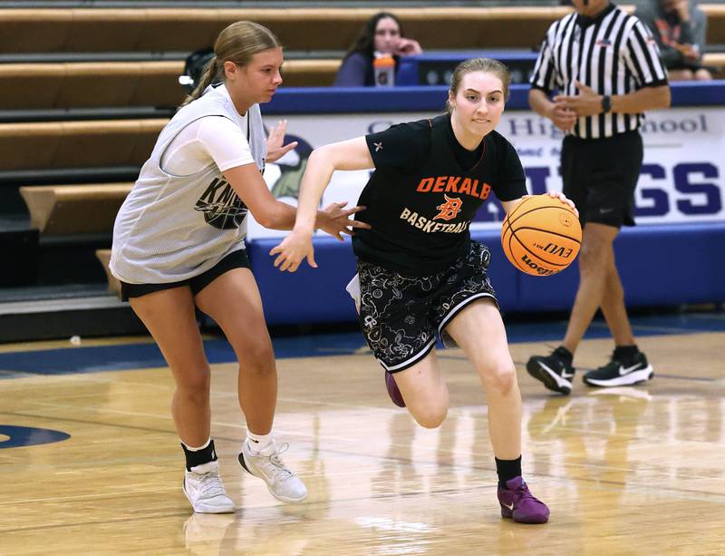 DeKalb’s Olivia Schermerhorn drives by a DeKalb defender Thursday, June 12, 2025, in the Geneva High School Varsity Summer League.