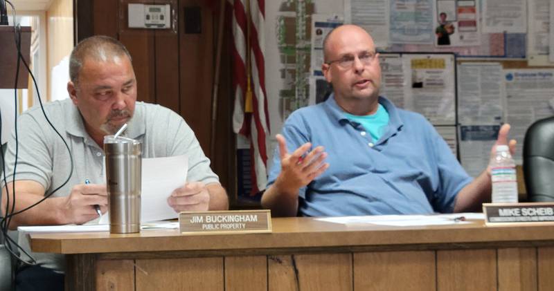 Marseilles Commissioner Mike Scheib (right) on Wednesday makes a point for his resolution to rescind the social media policy for employees and city officials. Scheib and Commissioner Jim Buckingham (also pictured) votes for the rescind, but lost the vote, 3-2.