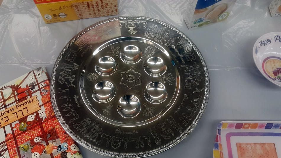 Passover trays, such as this one, hold the traditional foods served at a Seder. A Seder, according to one of the Joliet Jewish Congregation's pamphlet's, is a ritual meal where participants retell the story of the Israelites exodus from Egypt. Passover is the actual holiday celebrating the exodus.
