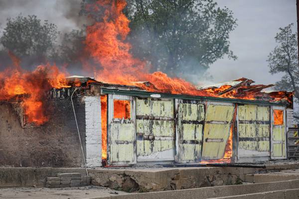 Barn consumed by fire near Huntley, crews stop spread to nearby buildings