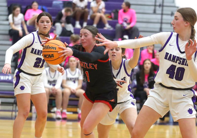 Huntley’s Lana Hobday navigates Hampshire traffic in varsity girls basketball on Wednesday, Feb. 11, 2026, at Hampshire High School in Hampshire.