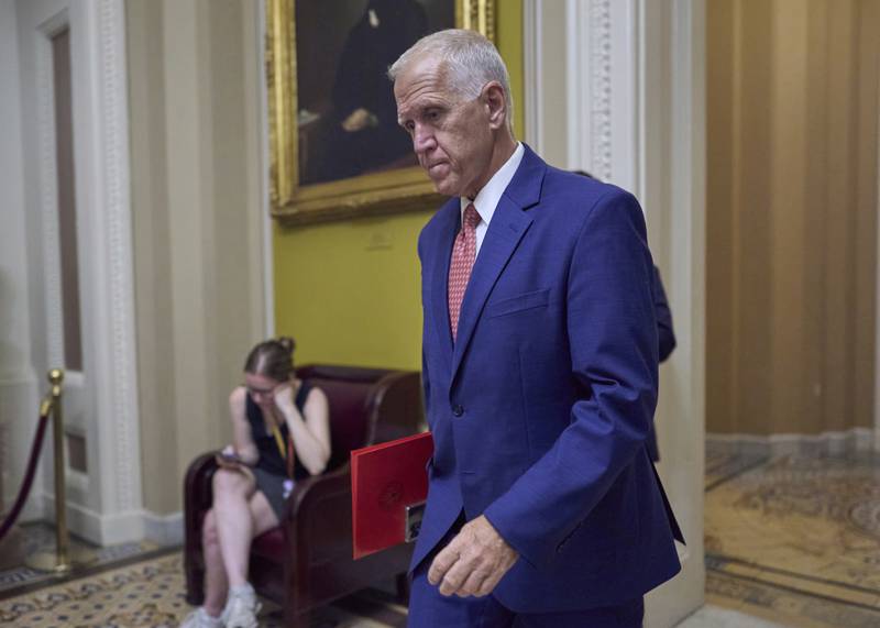 FILE - Sen. Thom Tillis, R-N.C., walks to the chamber as senators arrive for votes and policy meetings, at the Capitol in Washington, June 17, 2025. (AP Photo/J. Scott Applewhite, File)
