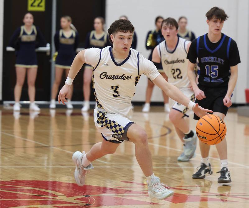Marquette's Easton Debernardi pushes the ball up ahead of Hinckley-Big Rock's Gavin Pickert Tuesday, March 3, 2026, during their sectional semifinal matchup at Amboy High School.