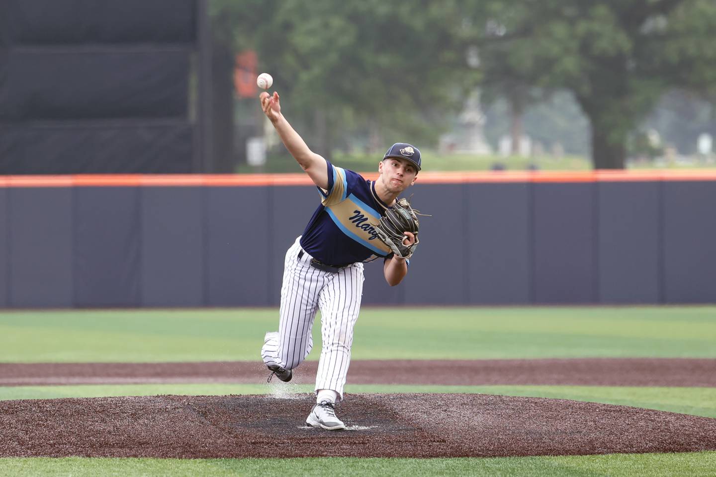 Ottawa Marquette’s Alec Novotney releases a pitch during the Crusaders' 16-1 victory over Lexington in the IHSA Class 1A State semifinal on Friday, June 6, 2025.