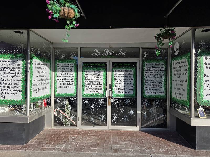 Nail Inn Academy at 160 N. Chicago St. in Joliet is seen with the entire text of "A Visit From St. Nicholas" by Clement C. Moore on its windows, on Tuesday, December 16, 2025.