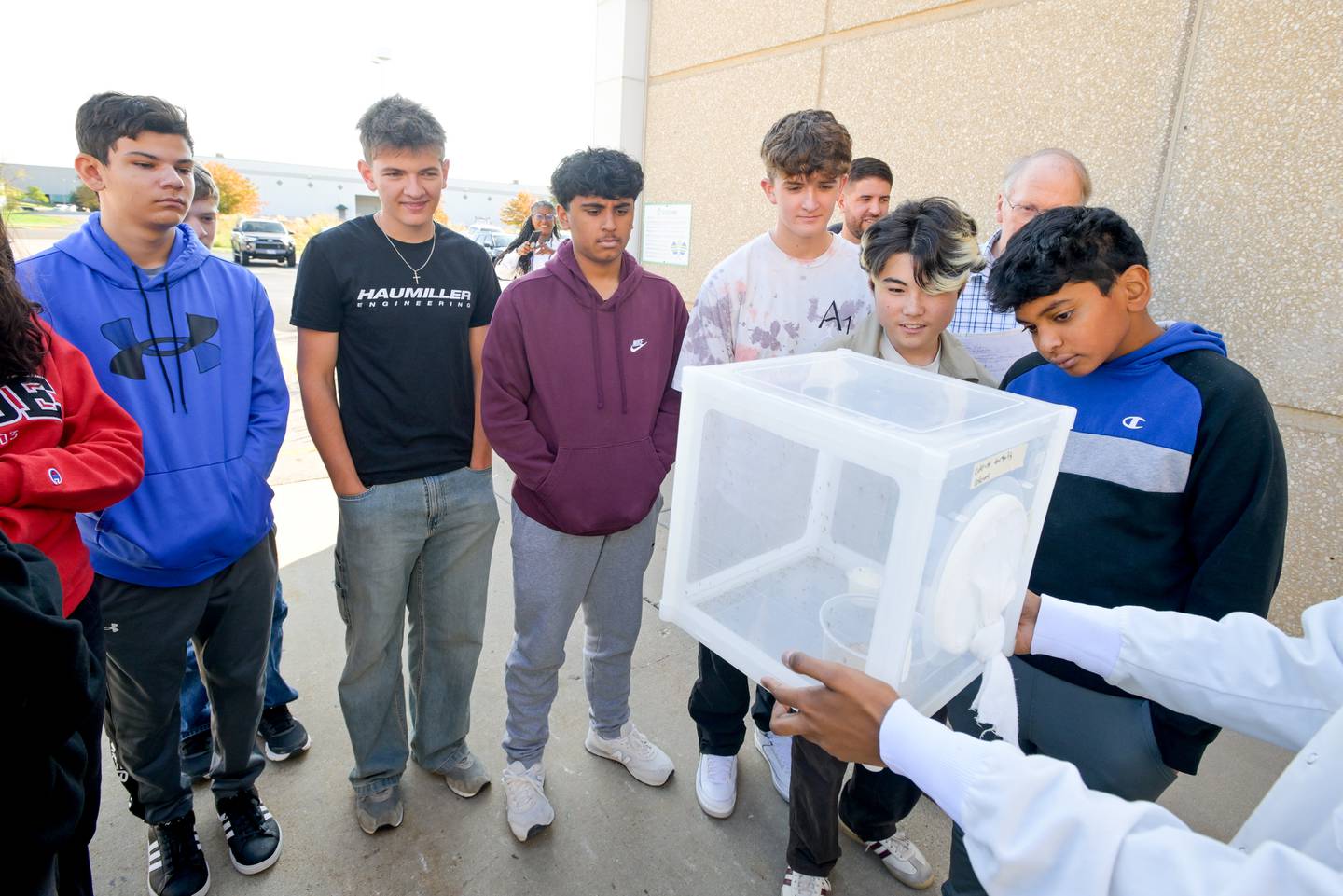 Students from St. Charles North High School view one of the mosquito colonies used to test mosquito abatement products from Clarke Mosquito Control and Management during an industrial tour in St. Charles on Thursday, Oct 16, 2025 in St. Charles.