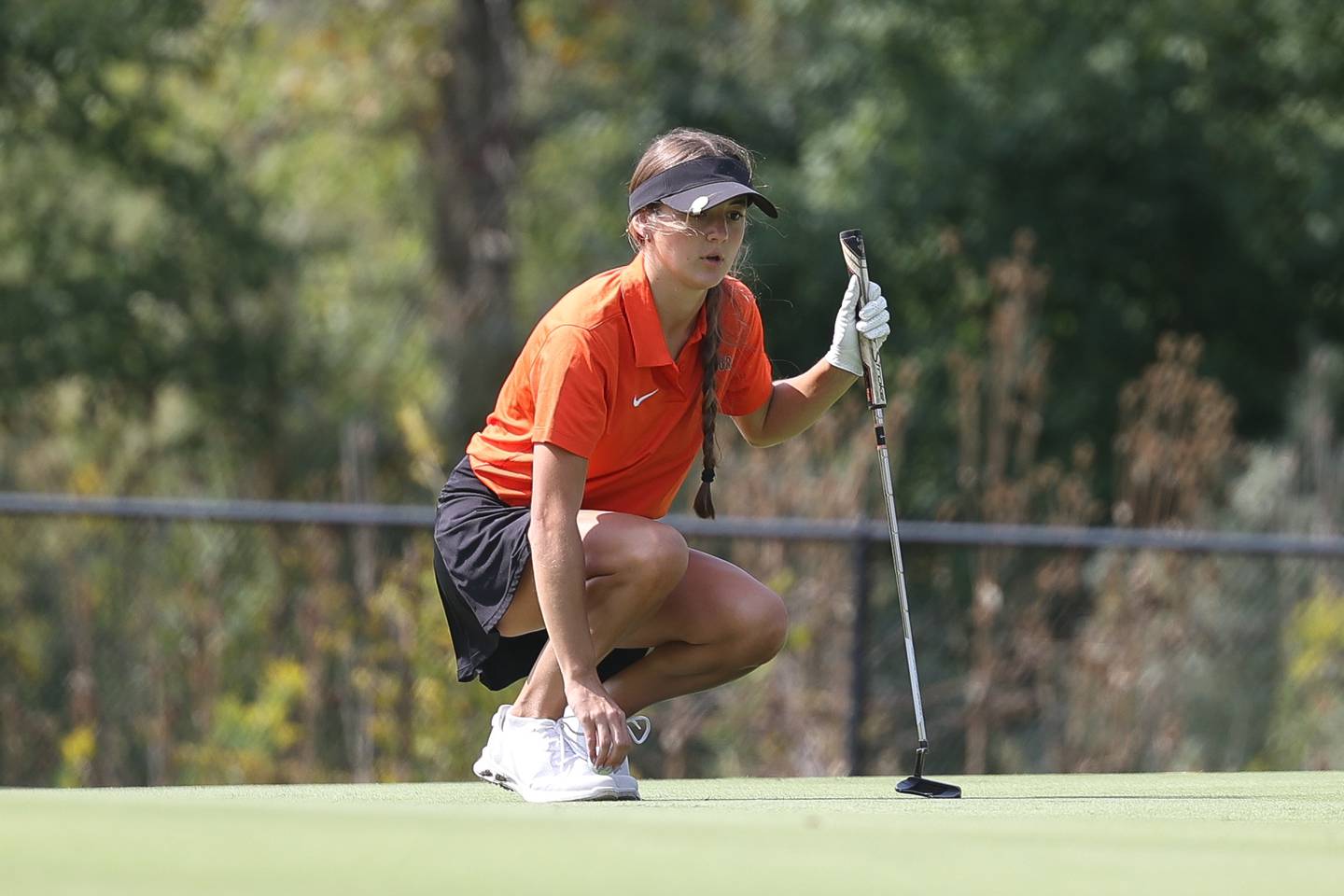 Lincoln-Way West’s Peyton White lines up a putt on the 16th hole at the Green Garden Country Club in Frankfort on Wednesday, Sept. 20.