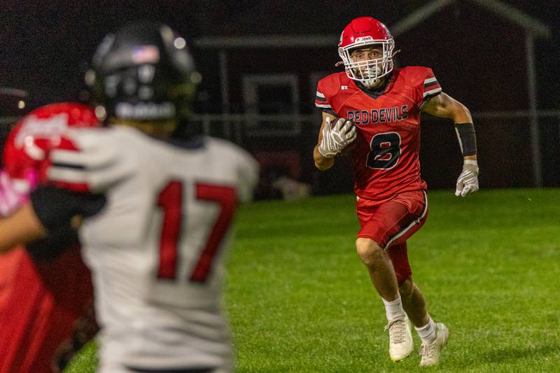 Braden Curran (8) of Hall runs ball on Friday, Sept 5, 2025 at Richard Nesti Stadium in Spring Valley.c