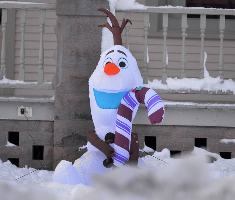 An Olaf inflatable, a snowman from the movie Frozen, was all smiles in Mt. Morris on Saturday, Jan. 13, 2024 after Friday's winter storm dumped 10-12 inches of snow on the village.
