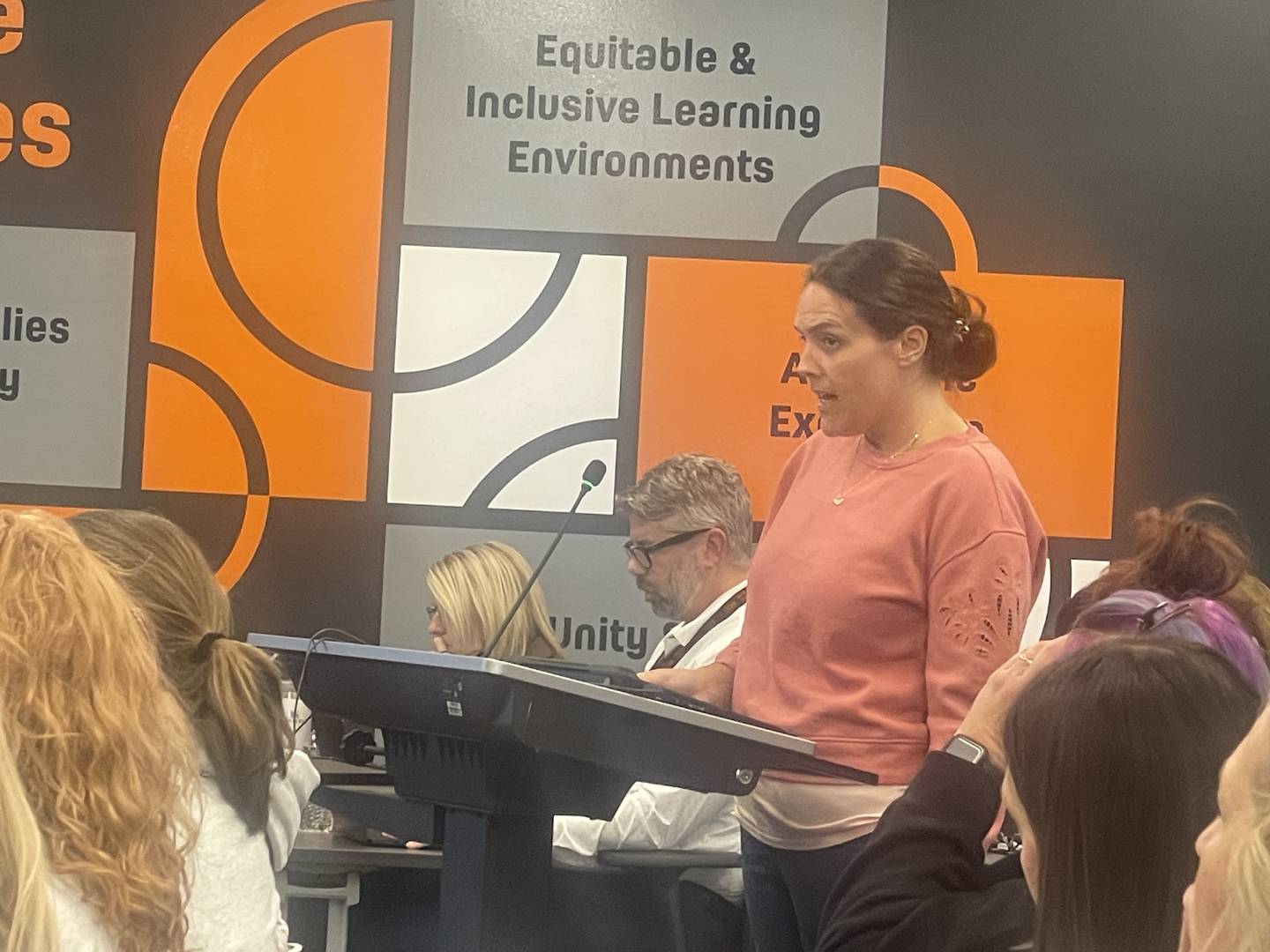 DeKalb resident Katie Pool, who serves as president of Founders Elementary School's PTO,  speaks out Nov. 18, 2025, on the district's plans for reconfiguring grade-level centers.