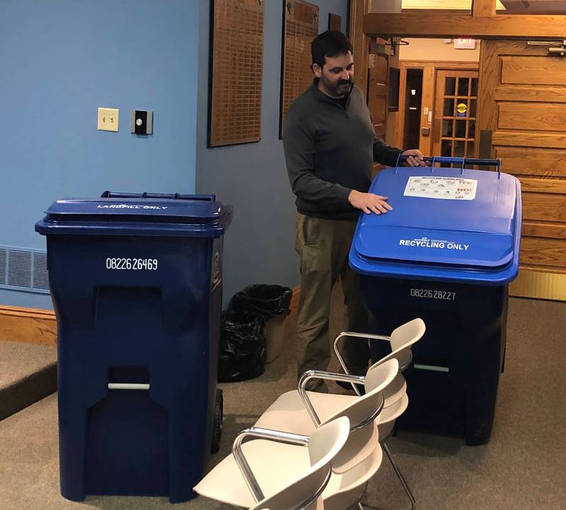La Salle Finance Director John Duncan demonstrates the difference between the new LRS trash and recycling bins to residents at City Hall on Tuesday, Jan 17, 2023.