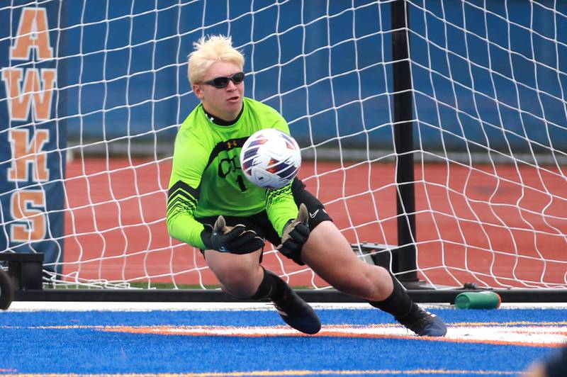 Crystal Lake South goal keeper Chris Slawek makes a save during the Class 2A state semifinal match against Rochester at Hoffman Estates High School on Friday, Nov. 3, 2023.
