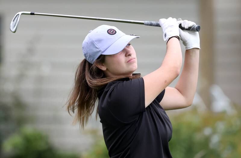 Sycamore-DeKalb co-op’s Brianna Chamoun hits her tee shot on the seventh hole Thursday, Sept. 28, 2023, during the Class 2A girls golf regional at Sycamore Golf Club in Sycamore.