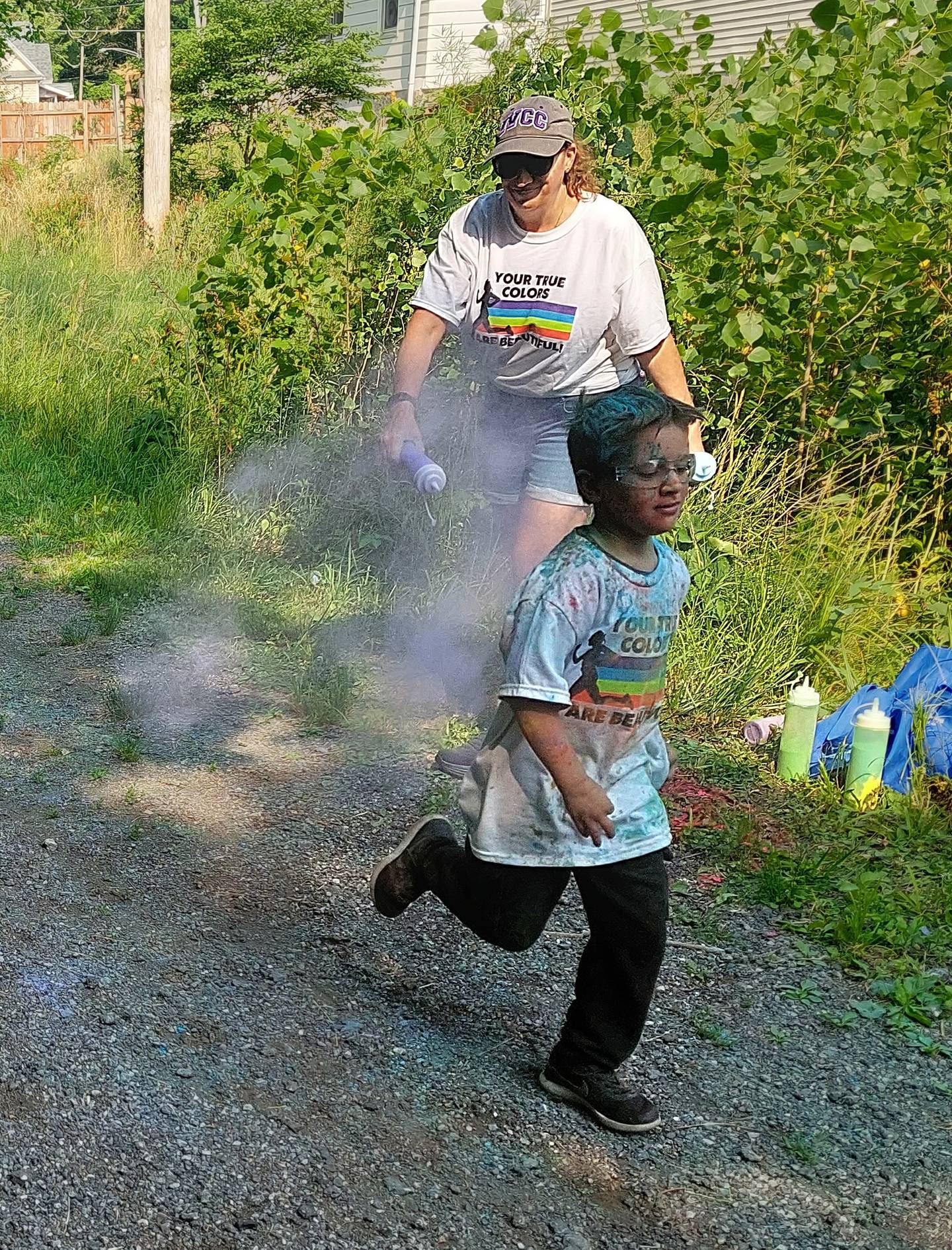 Louis Biros, of Streator, participates in the Safe Journeys Color Run on Saturday, June 17, 2023, on the Hopalong Cassidy Trail in Streator. Tracey Antle provides the color.