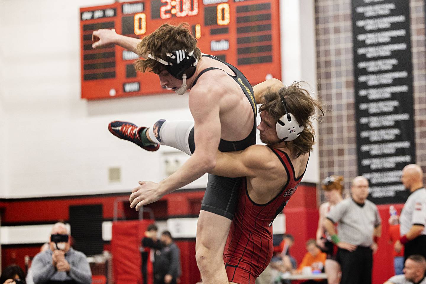 Erie Jase Grunder throws Lena-Winslow’s Garrett Luke in the 152 pound title match Saturday, Dec. 17, 2022 at the Erie-Prophetstown Holiday Tournament.