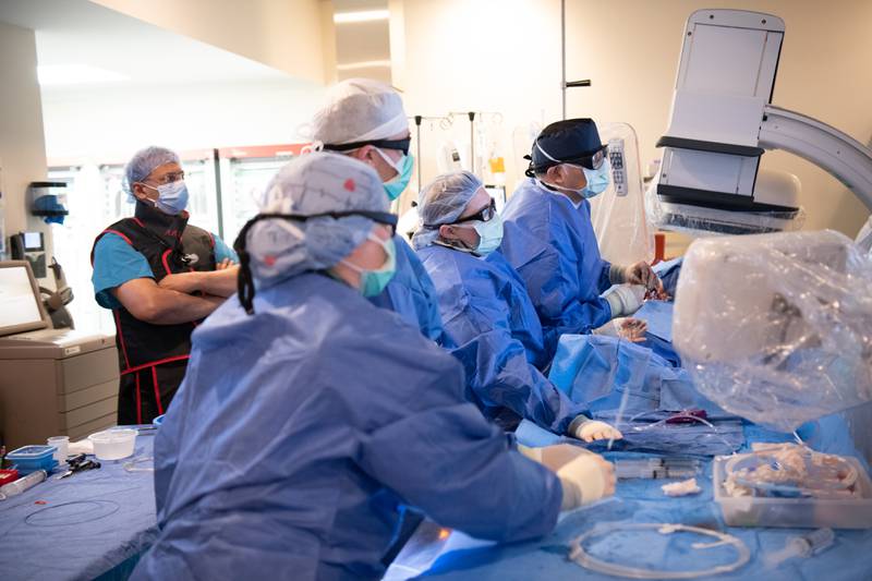 Medical staff at Northwestern McHenry Hospital perform the hospital's 100th Transcatheter Aortic Valve Replacement. Medicine