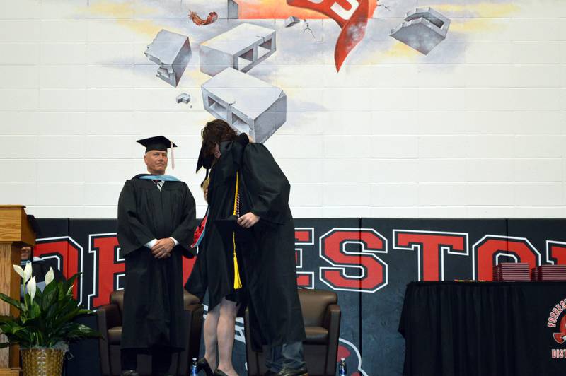 Forreston High School Class of 2023 valedictorian Brock Smith hugs his mother, Forrestville Valley School District Superintendent Sheri Smith, just prior to addressing his classmates during their May 14, 2023, commencement. Brock plans to study neural engineering at University of Illinois Urbana-Champaign.