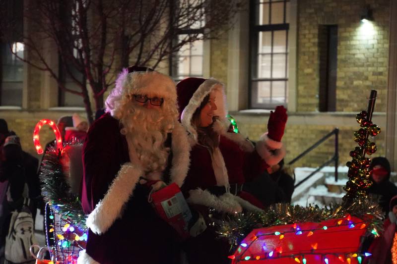 Santa Claus and Mrs. Claus ride in Rochelle's lighted Christmas parade on Friday, Dec. 5, 2025.