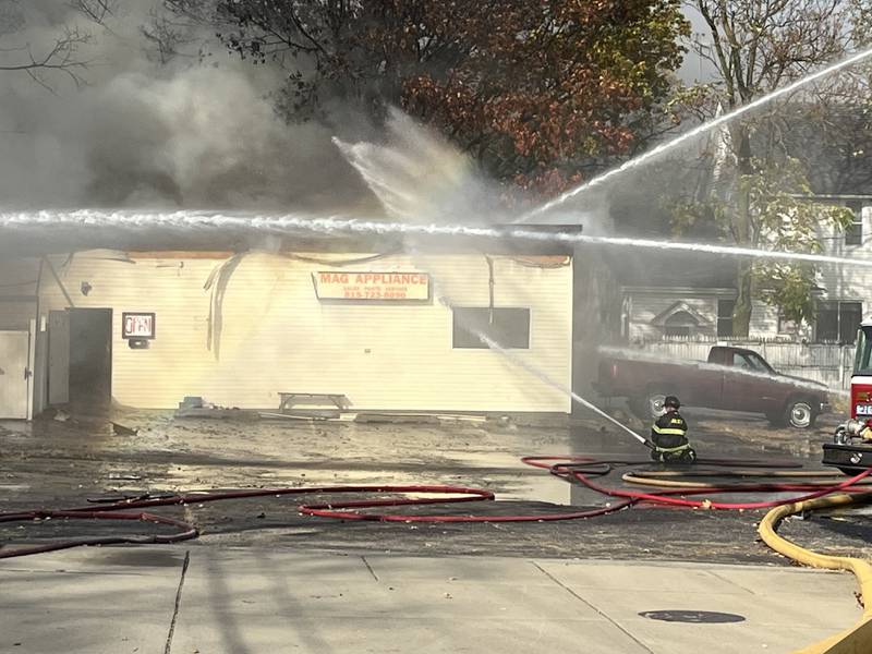 Joliet firefighters work to put out a fire at MAG Appliances, 1301 N. Broadway St., Joliet on Wednesday afternoon Oct. 30, 2024.