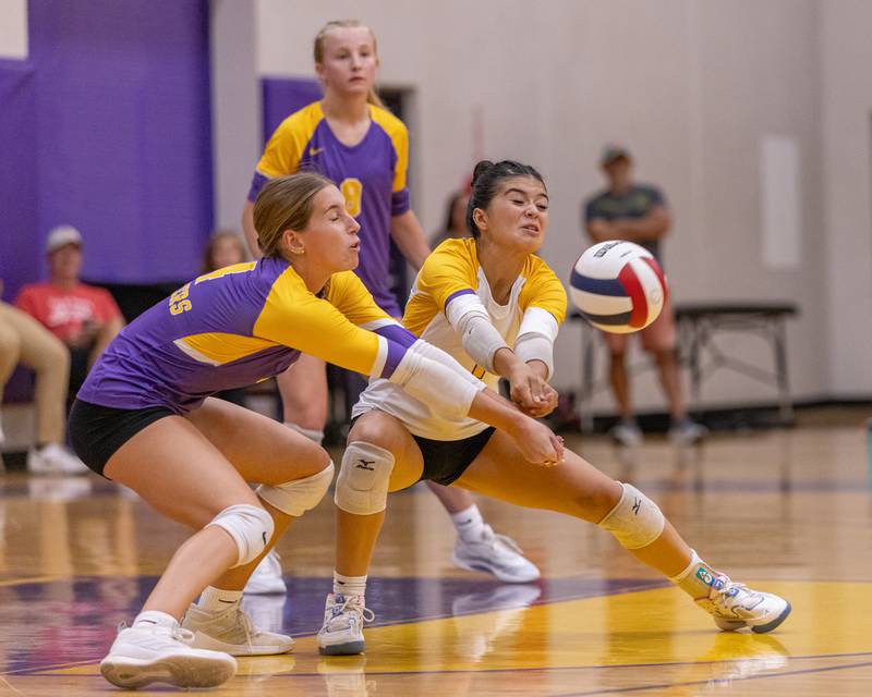 Laylie Denault and Zariah Escatel attempt to return a spike from Hall High School during the match at Auxiliary Gym on September 2, 2025 at Mendota High School.