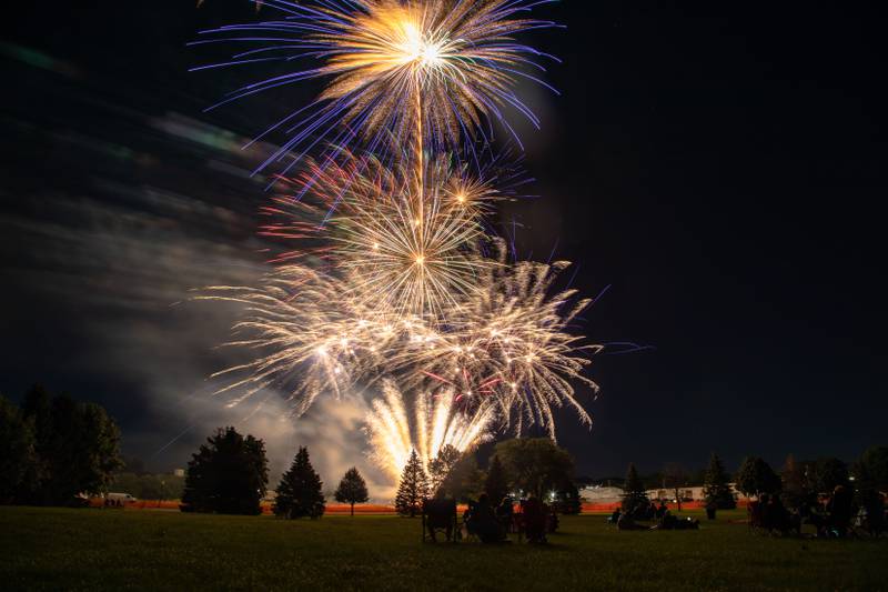 Patrons watch the fireworks during the Elburn Lions Club fireworks show at Lions Club Park on Saturday, July 9, 2022.