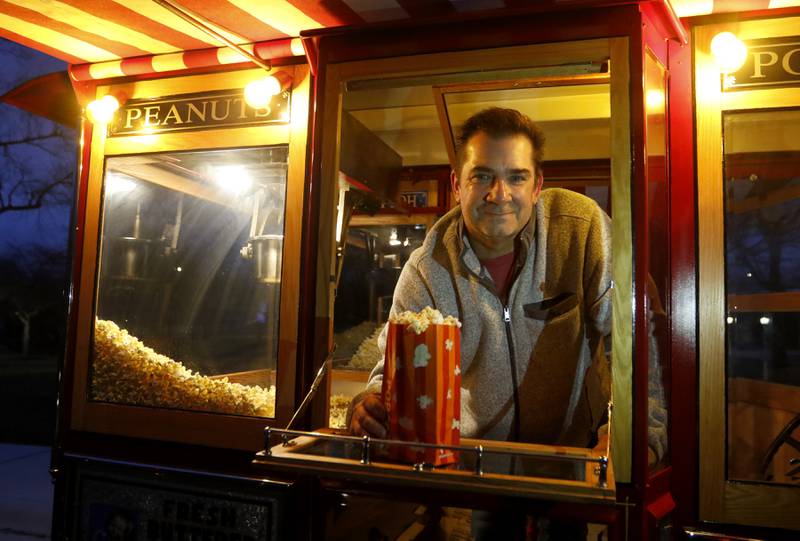 Scott Uglinica, of Volo, with a 1928 Ford Model Popcorn Wagon on Wednesday, Jan. 18, 2023, at Veterans Memorial Park in McHenry.