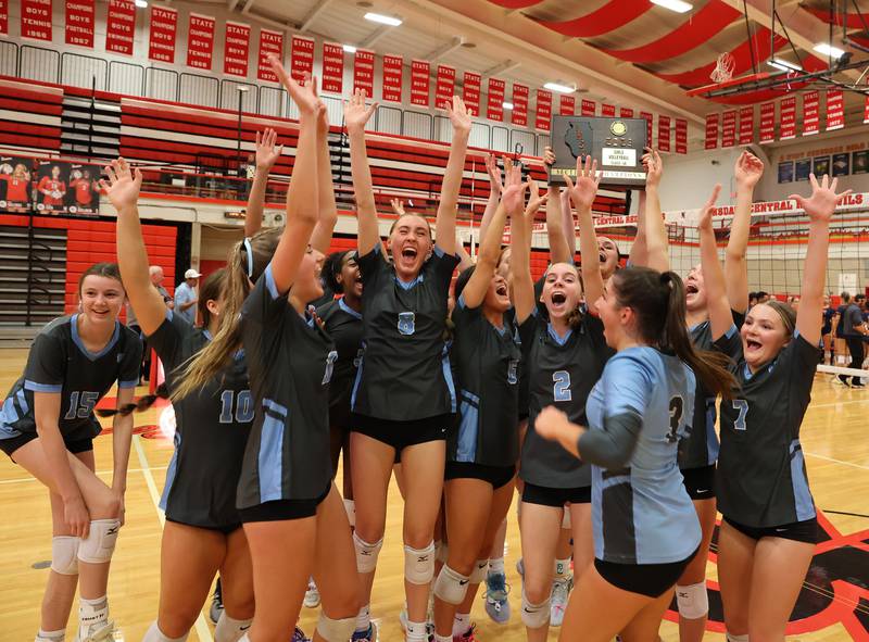 Willowbrook celebrate winning against Oak Park-River Forest at the 4A girls varsity volleyball sectional final match at Hinsdale Central high school on Wednesday, Nov. 1, 2023 in Hinsdale, IL.