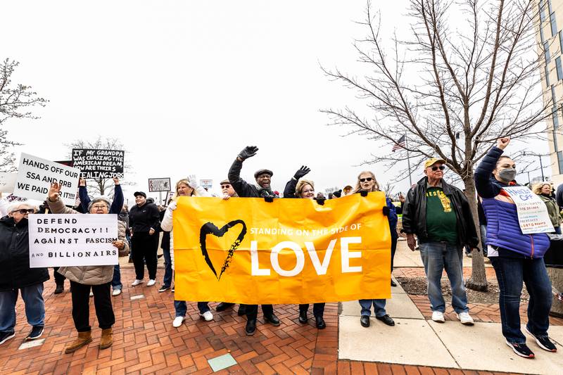 Attendees line Jefferson Street in Downtown Joliet during the Hands Off protest on April 5, 2025.