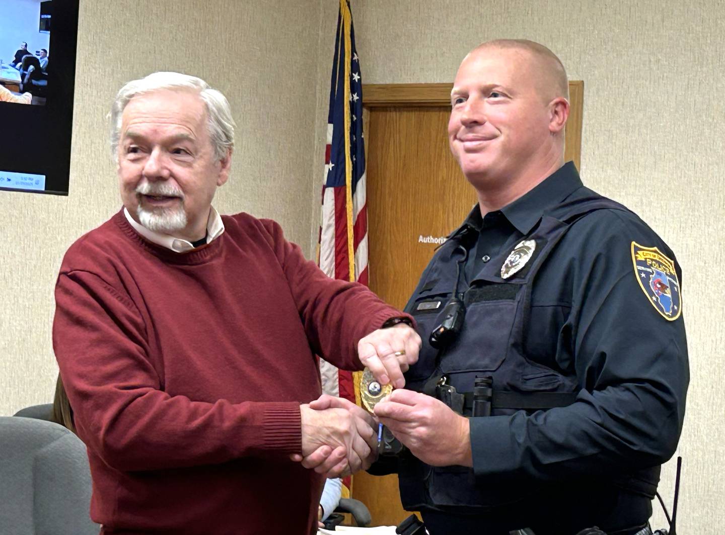 Oregon Mayor Ken Williams swore in Kevin Most as a a sergeant for the city's police department at the start of the Nov. 25, 2925 city council meeting.