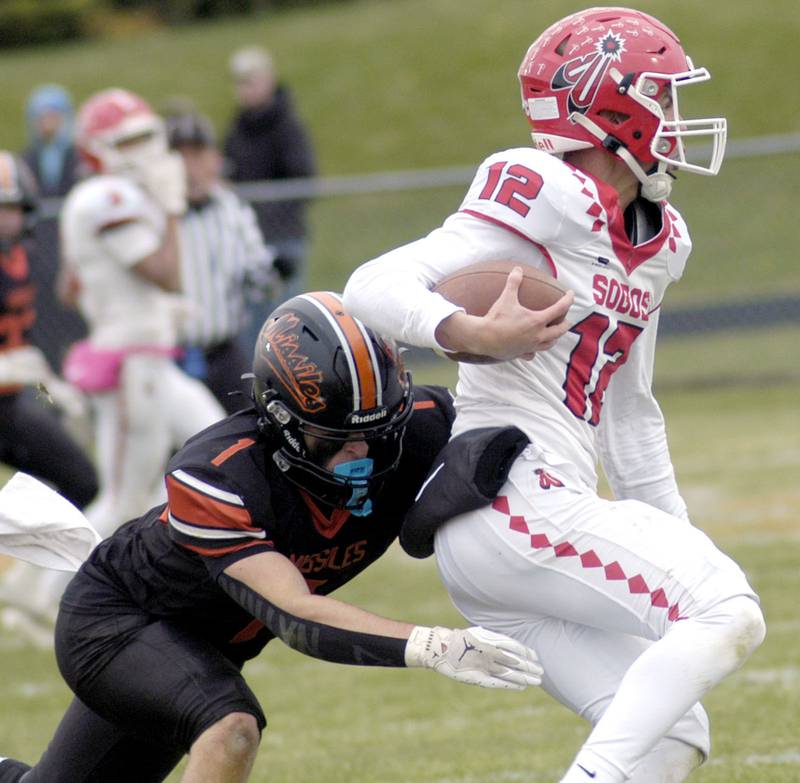 S. Beloit's Landen Reed is brought down by Milledgeville's Evan Schenck. The Milledgeville Missiles defeated the South Beloit SoBos 22-6 in Round 2 of the I8FB playoffs. The game took place at Milledgeville on Saturday, November 8th, 2025
