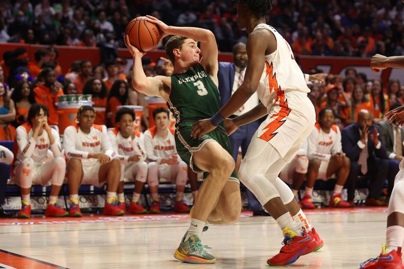 Glenbard West’s Caden Pierce looks to pass against Whitney Young in the Class 4A championship game at State Farm Center in Champaign. Saturday, Mar. 12, 2022, in Champaign.