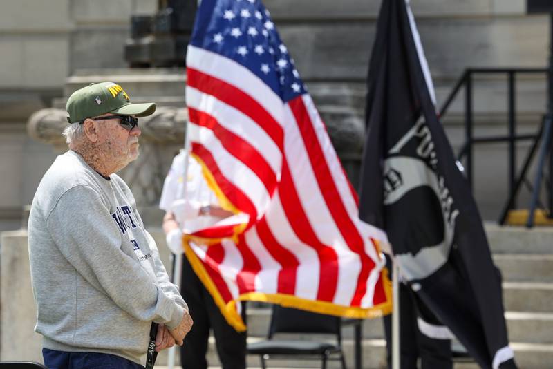 Army veteran Dennis Condit, now of Kankakee, listens to a song performed by Tim Rehmer on Monday, May 26, 2025, during the Kankakee County Veterans' Council annual Memorial Day Ceremony at the Kankakee County Courthouse.