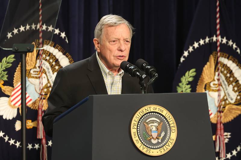 Senator Dick Durbin speaks before President Joe Biden takes the stage during his stop in Joliet at Jones Elementary School on Saturday.