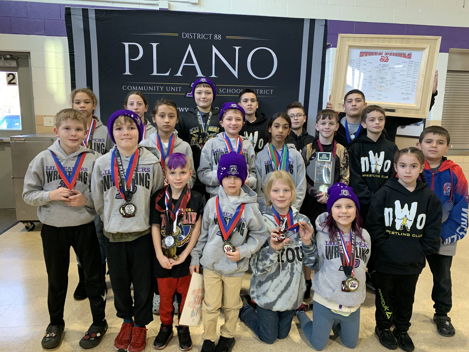 Plano School Board honors students for statewide wrestling achievements