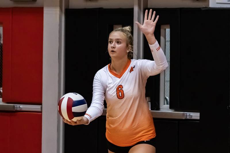 Minooka's Kendall Kozak serves during a varsity volleyball away game against Bolingbrook on Sept. 25, 2025.