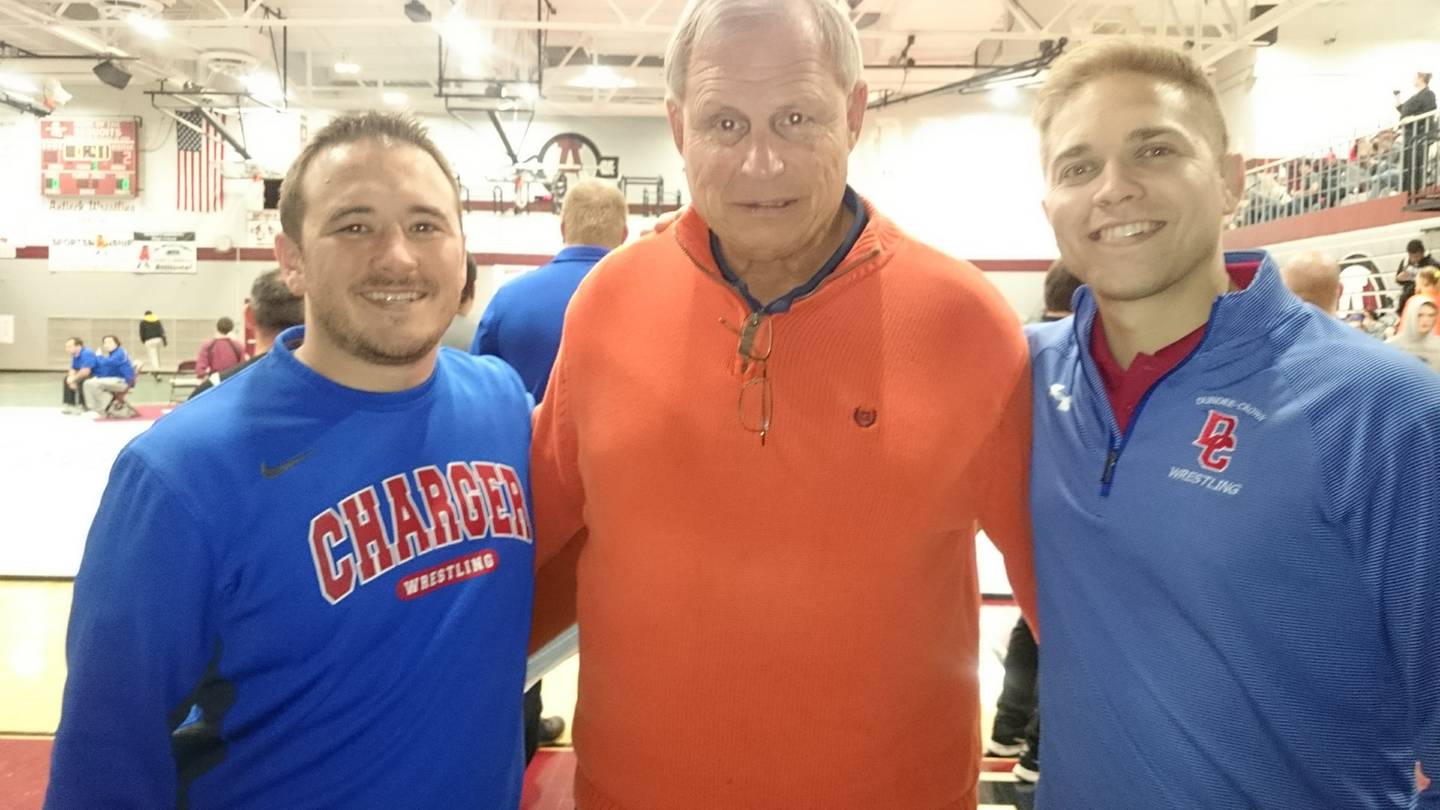 Dundee-Crown head coach Tim Hayes, former coach Al Zinke and former wrestler Brad Fiorito.